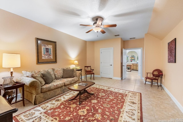 106 Oak Meadow Ln, Boerne, TX 78006 - living area featuring a ceiling fan and light tile patterned floors
