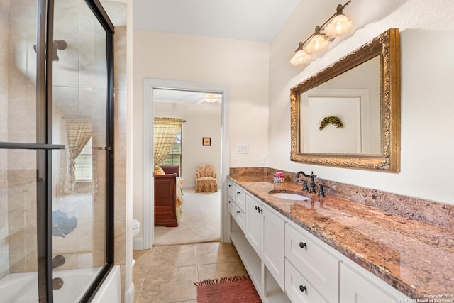 106 Oak Meadow Ln, Boerne, TX 78006 - bathroom featuring vanity, tile patterned flooring, and combined bath / shower with glass door