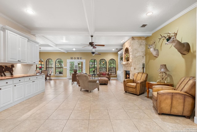 106 Oak Meadow Ln, Boerne, TX 78006 - living room with recessed lighting, light tile patterned flooring, beam ceiling, ceiling fan, and ornamental molding