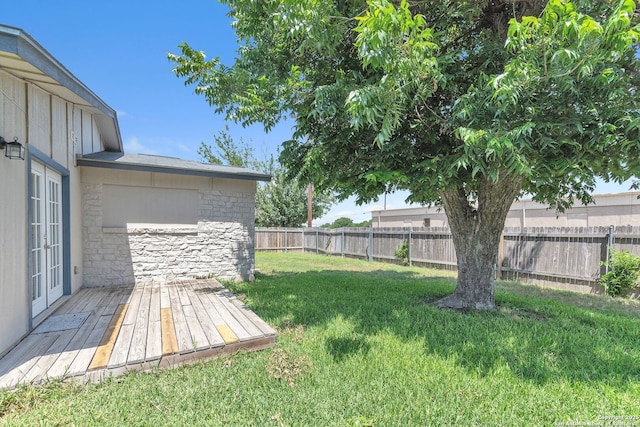 426 E Lindbergh, Universal City, TX 78148 - fenced backyard featuring french doors and a wooden deck