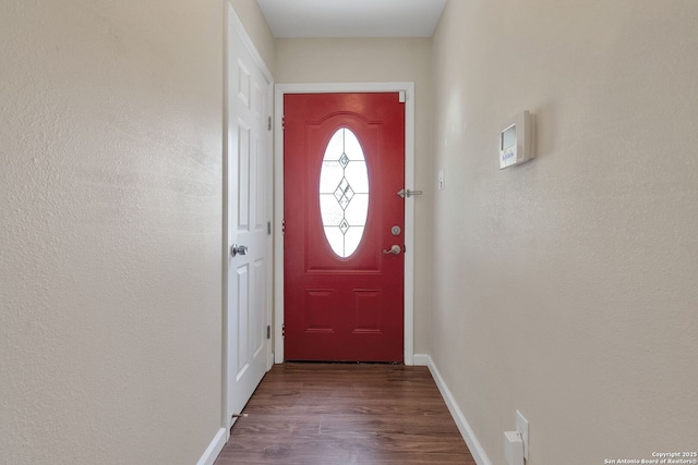 426 E Lindbergh, Universal City, TX 78148 - doorway to outside featuring wood finished floors and baseboards