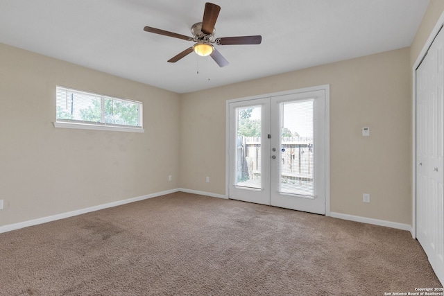 426 E Lindbergh, Universal City, TX 78148 - carpeted spare room featuring french doors and a ceiling fan