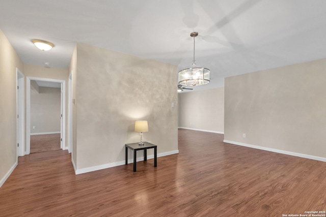 426 E Lindbergh, Universal City, TX 78148 - empty room featuring a chandelier and wood finished floors