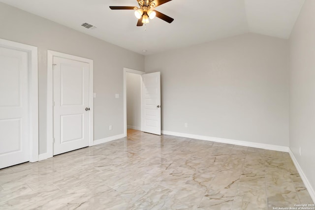 10302 Renova, San Antonio, TX 78214 - unfurnished bedroom featuring light marble finish floors, lofted ceiling, and ceiling fan