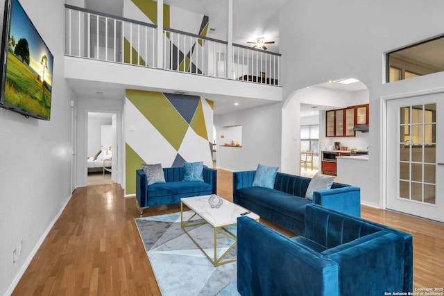 9647 Spring Harvest, San Antonio, TX 78254 - living room featuring wood finished floors and a high ceiling