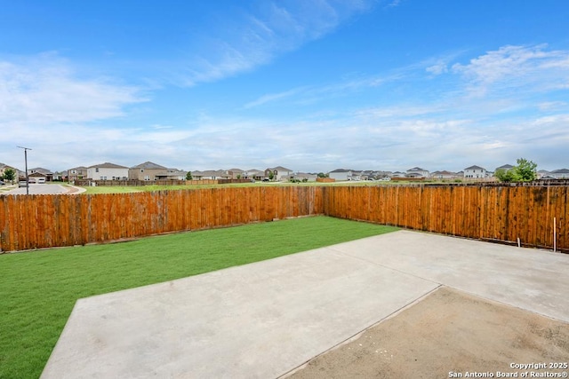 130 Texas Lantana, New Braunfels, TX 78130 - fenced backyard with a residential view and a patio