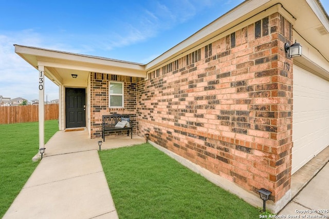 130 Texas Lantana, New Braunfels, TX 78130 - doorway to property featuring a garage and brick siding