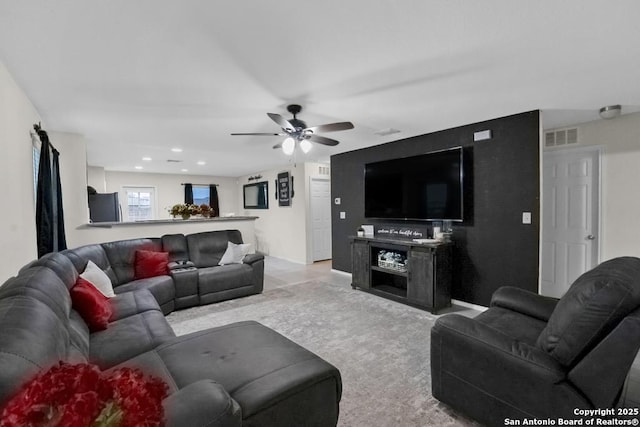 130 Texas Lantana, New Braunfels, TX 78130 - living room featuring ceiling fan and carpet