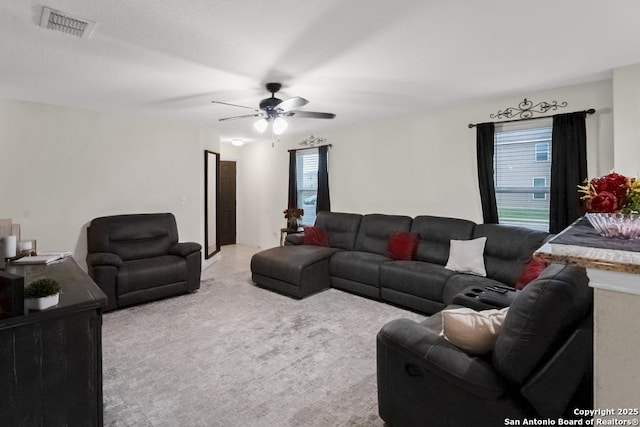 130 Texas Lantana, New Braunfels, TX 78130 - living area with plenty of natural light, a ceiling fan, and light carpet
