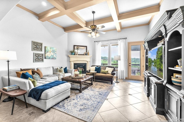 27306 Dana Crk, Boerne, TX 78015 - living room with beam ceiling, a glass covered fireplace, coffered ceiling, ceiling fan, and ornamental molding