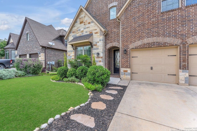 27306 Dana Crk, Boerne, TX 78015 - french country inspired facade featuring stone siding, a front yard, brick siding, and concrete driveway