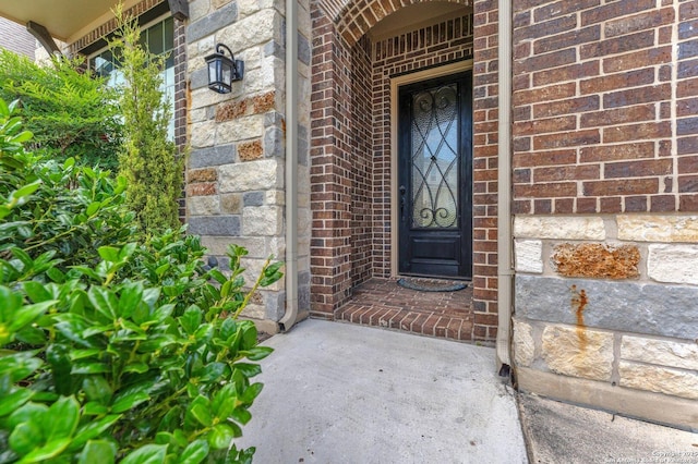 27306 Dana Crk, Boerne, TX 78015 - doorway to property featuring brick siding and stone siding