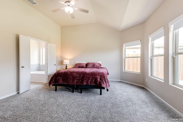 13609 Mineral Wl, San Antonio, TX 78253 - carpeted bedroom featuring lofted ceiling, multiple windows, ensuite bath, and ceiling fan