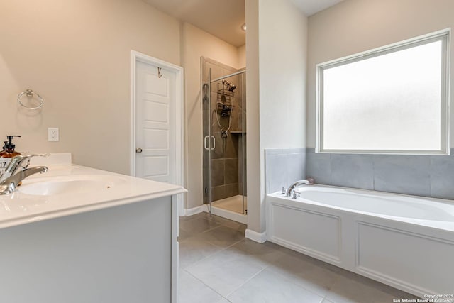 13609 Mineral Wl, San Antonio, TX 78253 - full bath featuring tile patterned floors, a garden tub, a stall shower, and double vanity