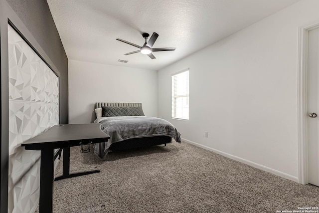 13609 Mineral Wl, San Antonio, TX 78253 - carpeted bedroom with ceiling fan and a textured ceiling