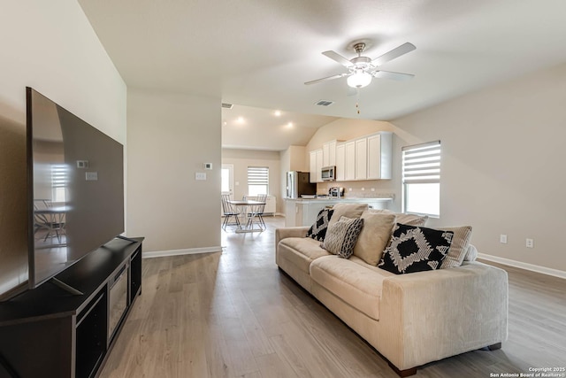 13609 Mineral Wl, San Antonio, TX 78253 - living area featuring ceiling fan, vaulted ceiling, and light wood-type flooring