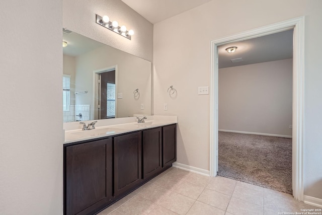 8904 Portobello Way, Converse, TX 78109 - bathroom featuring double vanity and tile patterned floors