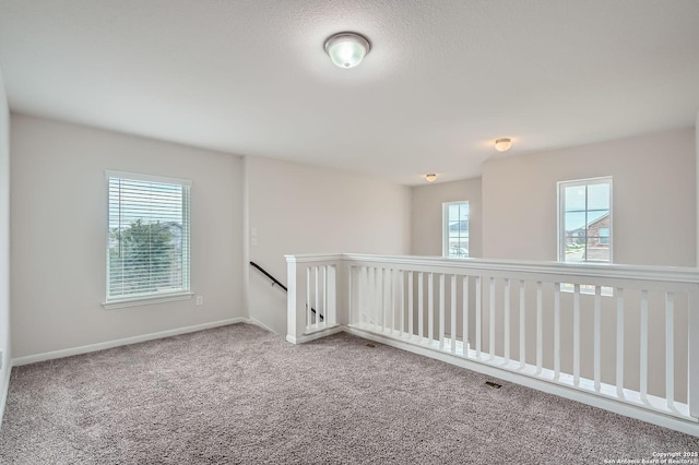 8904 Portobello Way, Converse, TX 78109 - carpeted empty room featuring baseboards