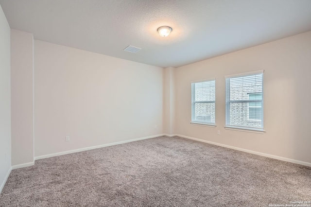 8904 Portobello Way, Converse, TX 78109 - carpeted empty room with baseboards