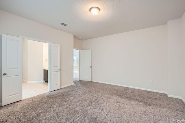 8904 Portobello Way, Converse, TX 78109 - unfurnished bedroom with light colored carpet