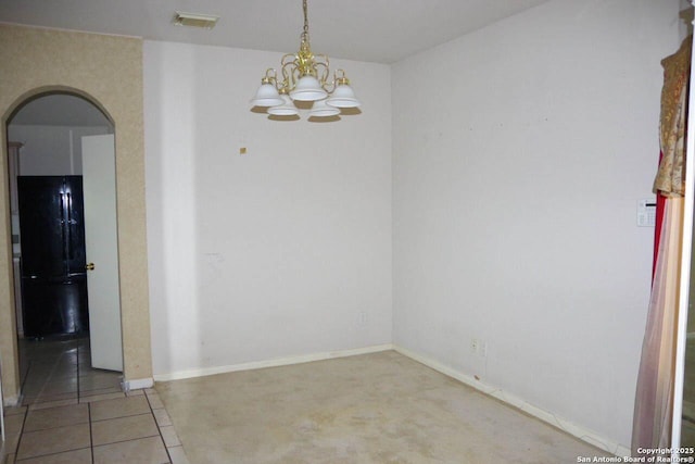 8415 Copperbluff, Converse, TX 78109 - unfurnished room featuring arched walkways, a chandelier, and tile patterned flooring