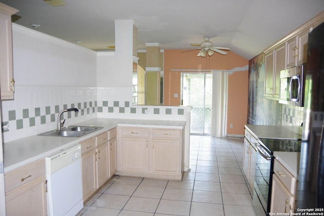 8415 Copperbluff, Converse, TX 78109 - kitchen featuring stainless steel appliances, ceiling fan, decorative backsplash, light countertops, and vaulted ceiling