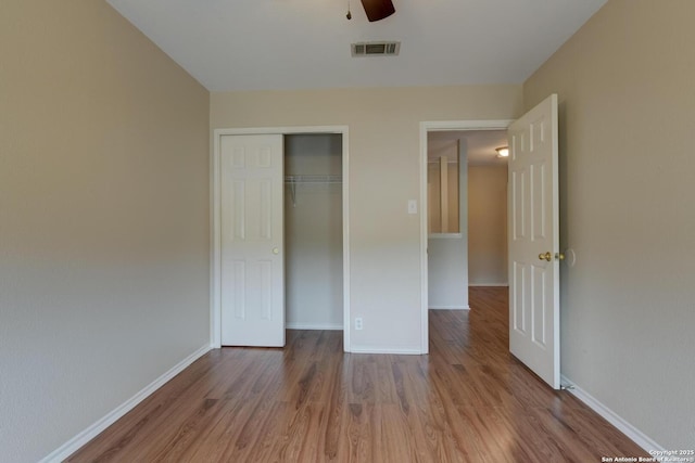 11906 Creek Peak, San Antonio, TX 78253 - unfurnished bedroom featuring wood finished floors, a closet, and a ceiling fan