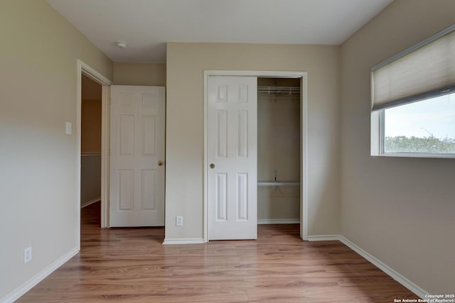 11906 Creek Peak, San Antonio, TX 78253 - unfurnished bedroom with a closet and light wood-style flooring