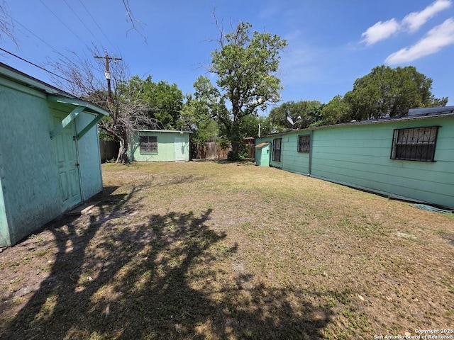 115 Dumont, San Antonio, TX 78227 - view of yard with an outdoor structure