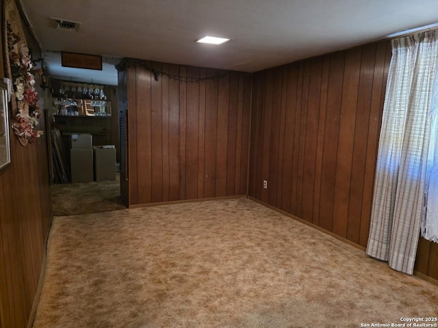 115 Dumont, San Antonio, TX 78227 - carpeted spare room with wooden walls