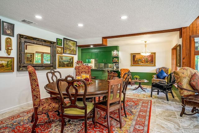 505 Winfield Blvd, Windcrest, TX 78239 - dining space featuring a textured ceiling, a chandelier, and recessed lighting