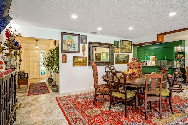 505 Winfield Blvd, Windcrest, TX 78239 - dining space featuring a textured ceiling and recessed lighting