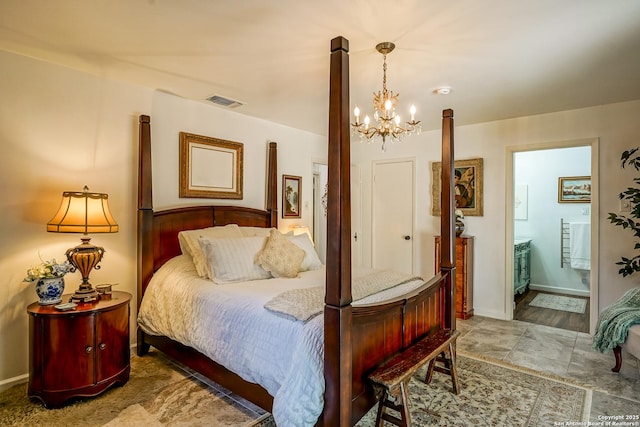 505 Winfield Blvd, Windcrest, TX 78239 - bedroom with a chandelier and connected bathroom