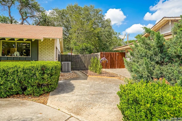 505 Winfield Blvd, Windcrest, TX 78239 - view of home's exterior featuring brick siding and roof with shingles