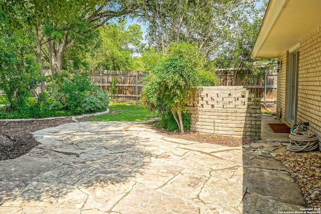 505 Winfield Blvd, Windcrest, TX 78239 - fenced backyard featuring a patio