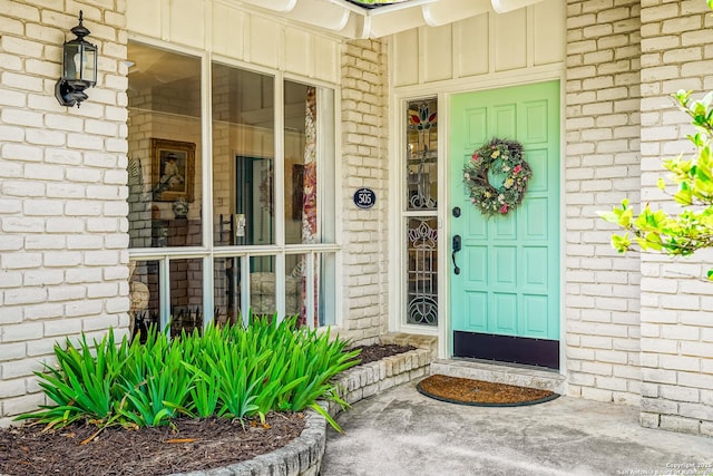 505 Winfield Blvd, Windcrest, TX 78239 - property entrance with board and batten siding, brick siding, and covered porch