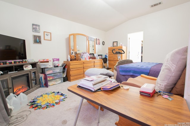 9075-1 W Foxgrove Way, San Antonio, TX 78251 - bedroom with lofted ceiling, carpet flooring, and a glass covered fireplace