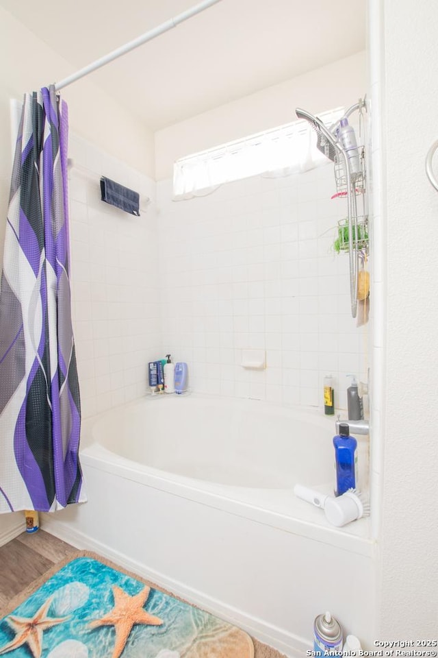 9075-1 W Foxgrove Way, San Antonio, TX 78251 - bathroom with shower / bath combo and wood finished floors