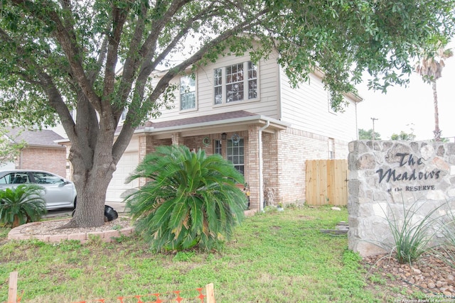 9075-1 W Foxgrove Way, San Antonio, TX 78251 - view of side of property with brick siding and a garage