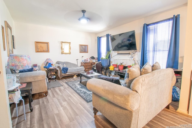 9075-1 W Foxgrove Way, San Antonio, TX 78251 - living area with ceiling fan and light wood-style flooring