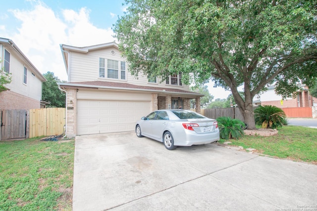 9075-1 W Foxgrove Way, San Antonio, TX 78251 - view of front of property featuring a garage, brick siding, and driveway