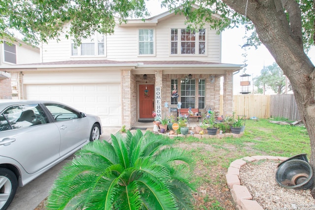 9075-1 W Foxgrove Way, San Antonio, TX 78251 - view of front facade with a porch, brick siding, and an attached garage