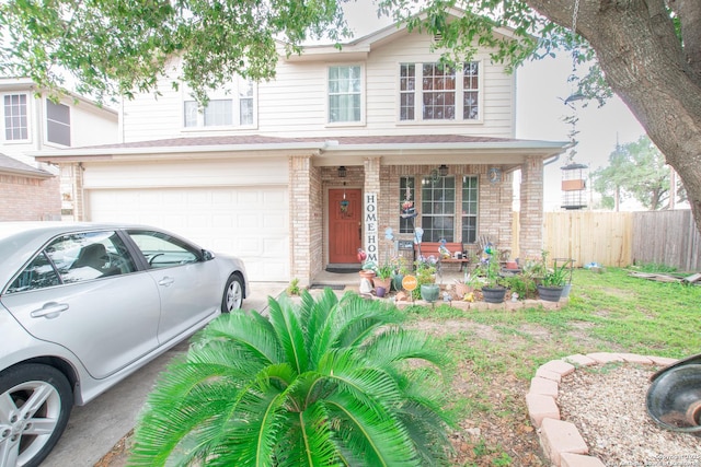 9075-1 W Foxgrove Way, San Antonio, TX 78251 - view of front of house featuring covered porch, a garage, and brick siding