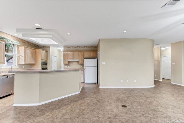 2434 Trace Oak, San Antonio, TX 78232 - kitchen with appliances with stainless steel finishes, light brown cabinetry, light countertops, under cabinet range hood, and open floor plan