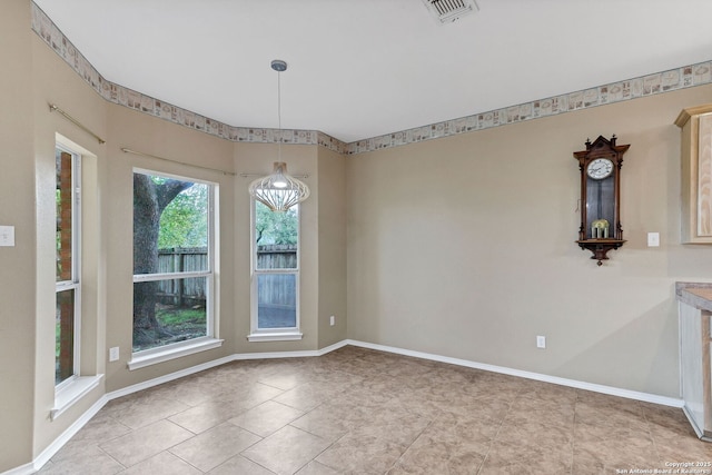 2434 Trace Oak, San Antonio, TX 78232 - unfurnished dining area with baseboards and light tile patterned floors