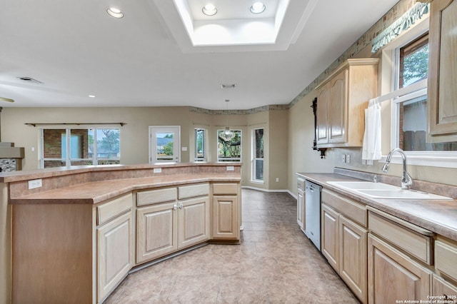 2434 Trace Oak, San Antonio, TX 78232 - kitchen featuring light brown cabinets, recessed lighting, light countertops, dishwasher, and a tray ceiling