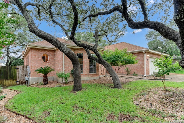 2434 Trace Oak, San Antonio, TX 78232 - view of front facade featuring brick siding, a garage, and roof with shingles