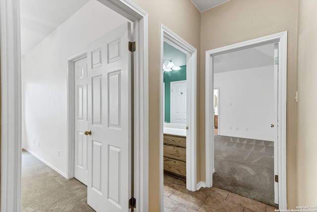 2434 Trace Oak, San Antonio, TX 78232 - corridor with carpet flooring and tile patterned flooring