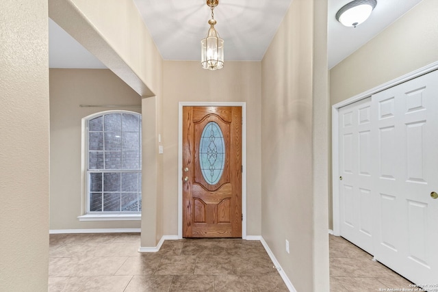 2434 Trace Oak, San Antonio, TX 78232 - tiled entrance foyer with baseboards and a chandelier