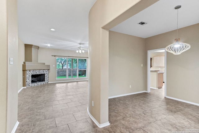 2434 Trace Oak, San Antonio, TX 78232 - unfurnished living room featuring ceiling fan, tile patterned flooring, and a fireplace